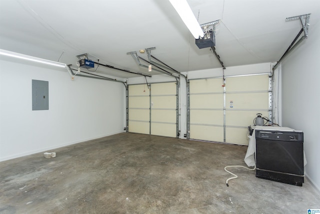 garage with electric panel and a garage door opener