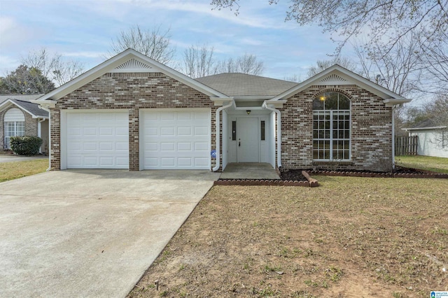 single story home with an attached garage, driveway, a front yard, and brick siding