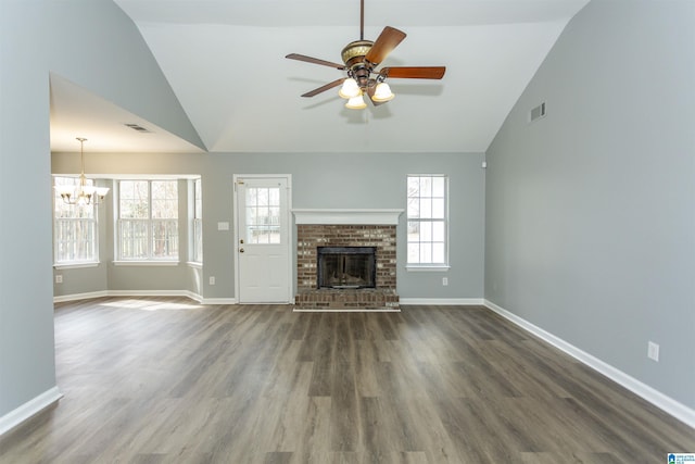 unfurnished living room with lofted ceiling, visible vents, and dark wood-style flooring