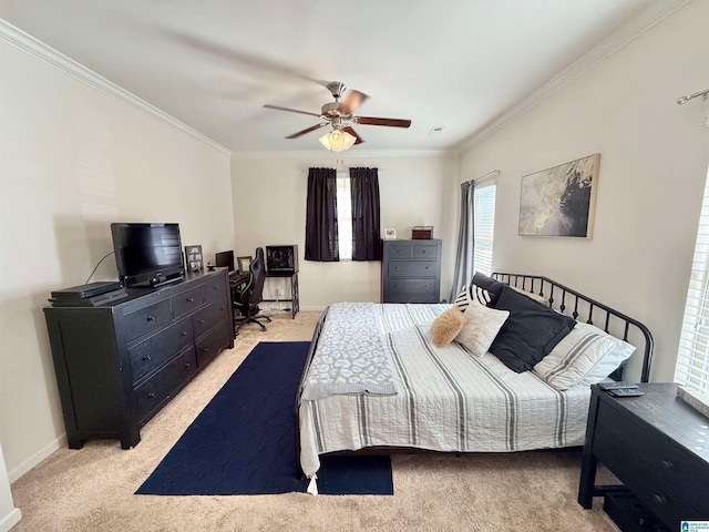 bedroom with baseboards, ornamental molding, ceiling fan, and light colored carpet