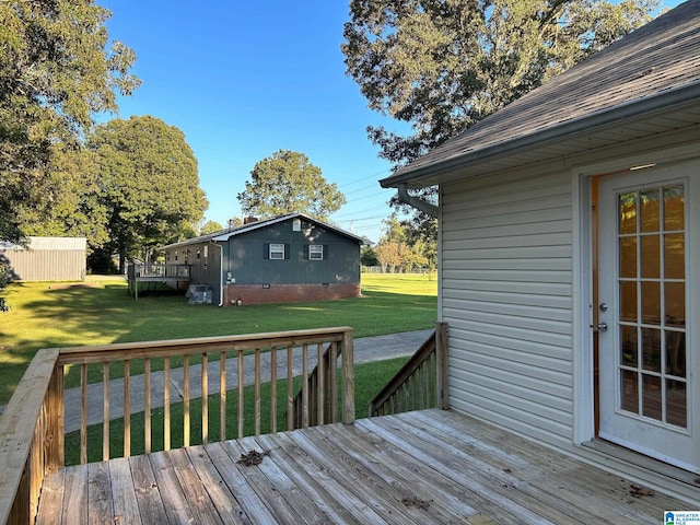 deck featuring a yard