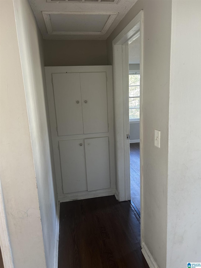 hall featuring dark wood finished floors