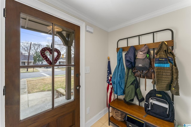 mudroom featuring light tile patterned floors, ornamental molding, and baseboards