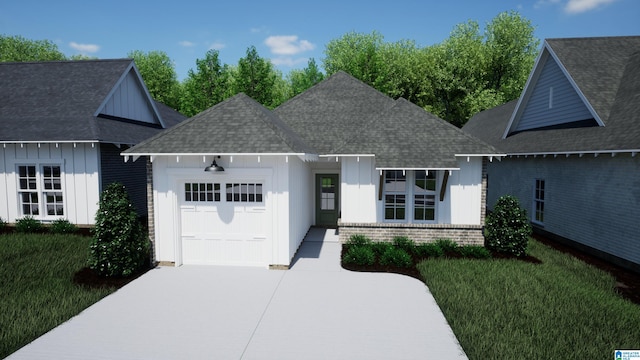 view of front of property with concrete driveway, roof with shingles, an attached garage, board and batten siding, and brick siding