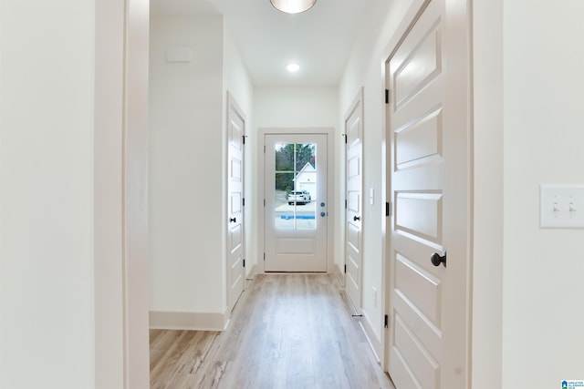 doorway with light wood-style floors