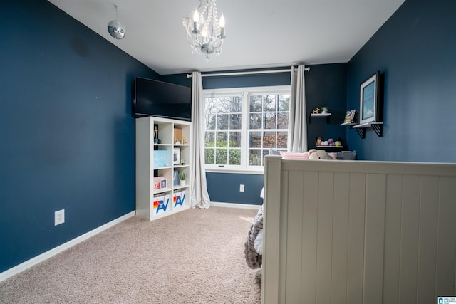 bedroom with carpet floors, baseboards, and an inviting chandelier