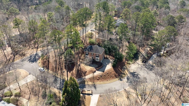 aerial view featuring a view of trees