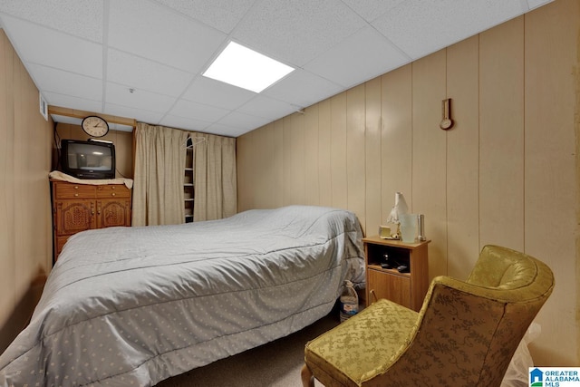 bedroom with a drop ceiling