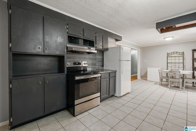 1877 Old Sylacauga Hwy, Sylacauga, AL 35150 - kitchen featuring light tile patterned floors, electric stove, dark cabinets, freestanding refrigerator, and crown molding