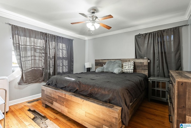 1877 Old Sylacauga Hwy, Sylacauga, AL 35150 - bedroom with baseboards, wood finished floors, and crown molding