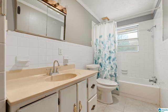 1877 Old Sylacauga Hwy, Sylacauga, AL 35150 - bathroom with shower / tub combo, tile patterned floors, a textured ceiling, vanity, and tile walls