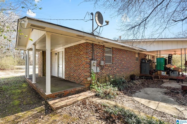 1877 Old Sylacauga Hwy, Sylacauga, AL 35150 - view of side of home with brick siding