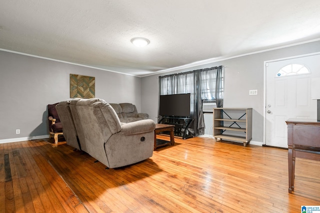 1877 Old Sylacauga Hwy, Sylacauga, AL 35150 - living room featuring ornamental molding, a wealth of natural light, baseboards, and wood finished floors