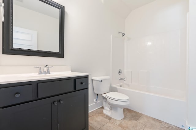 bathroom featuring  shower combination, vanity, and toilet