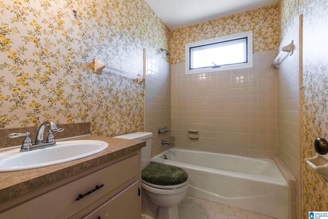 full bath with wallpapered walls, toilet, tile patterned floors, vanity, and washtub / shower combination