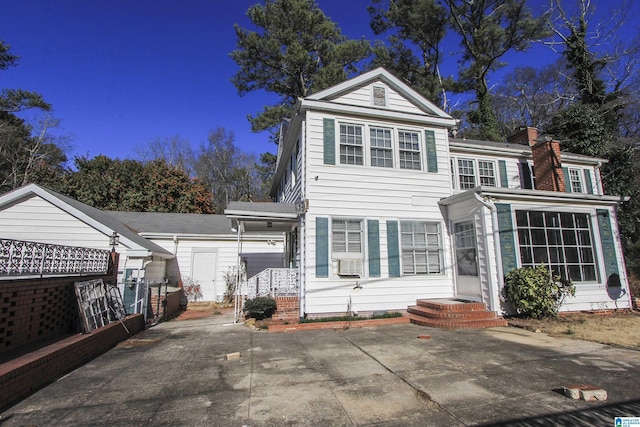 view of front of home featuring a patio area