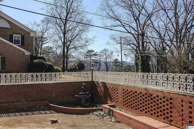 view of yard featuring a patio area and fence