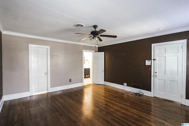 interior space featuring visible vents, baseboards, a ceiling fan, dark wood finished floors, and crown molding