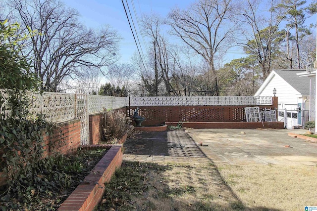 view of yard with a patio and a fenced backyard