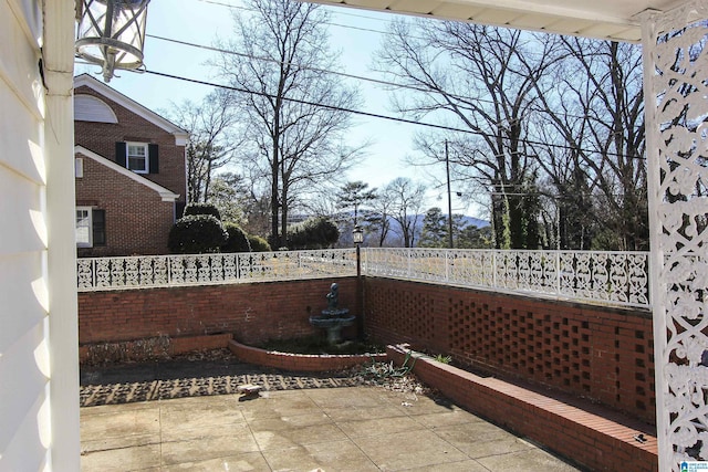 view of patio / terrace with fence