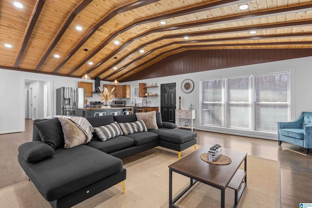 living area with wooden ceiling, vaulted ceiling, and light wood finished floors