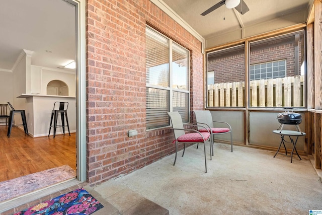 view of patio featuring ceiling fan