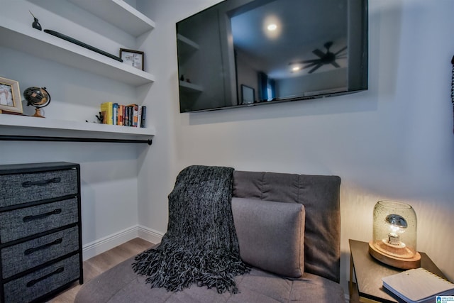 sitting room featuring wood finished floors and baseboards