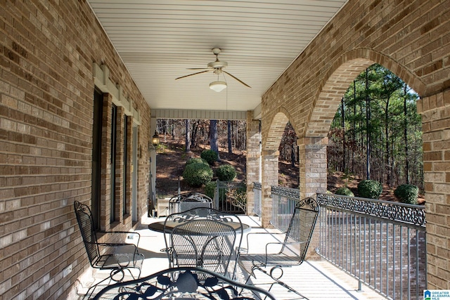 view of patio featuring ceiling fan