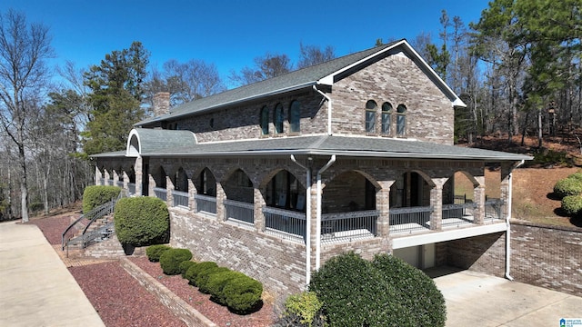 view of side of property with brick siding