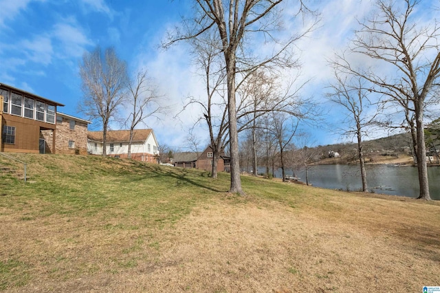 view of yard with a water view