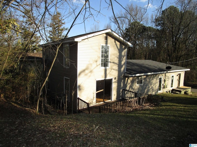 view of property exterior featuring a yard