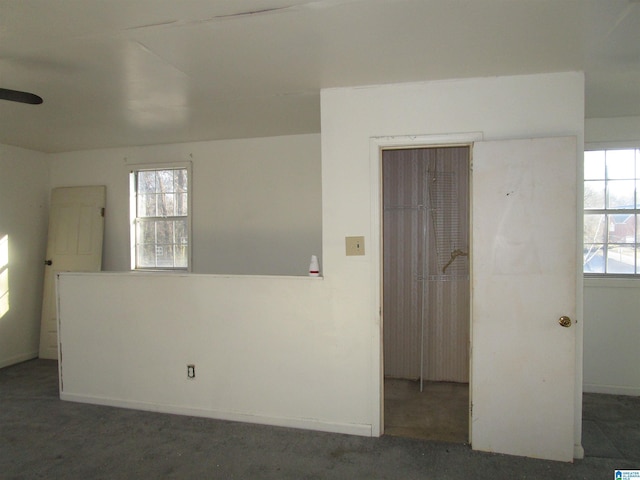 empty room featuring ceiling fan