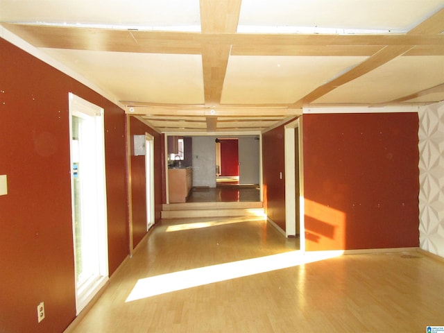 interior space with coffered ceiling and wood finished floors