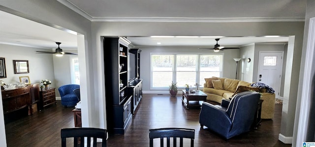 living area with a ceiling fan, baseboards, dark wood-type flooring, and crown molding