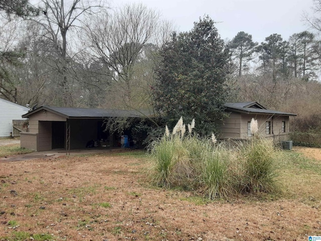 exterior space with a carport