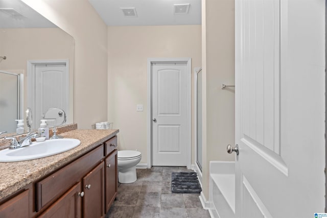 full bath with a stall shower, visible vents, and vanity