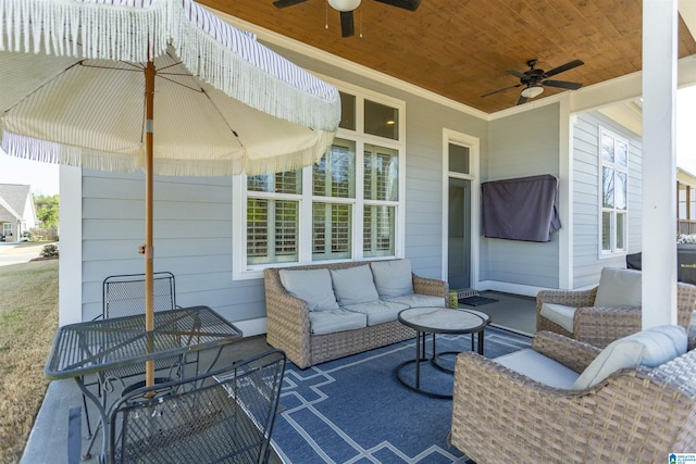 view of patio / terrace featuring a ceiling fan and an outdoor living space