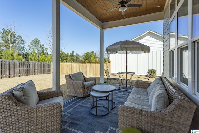 view of patio / terrace featuring ceiling fan, outdoor lounge area, a fenced backyard, and outdoor dining space