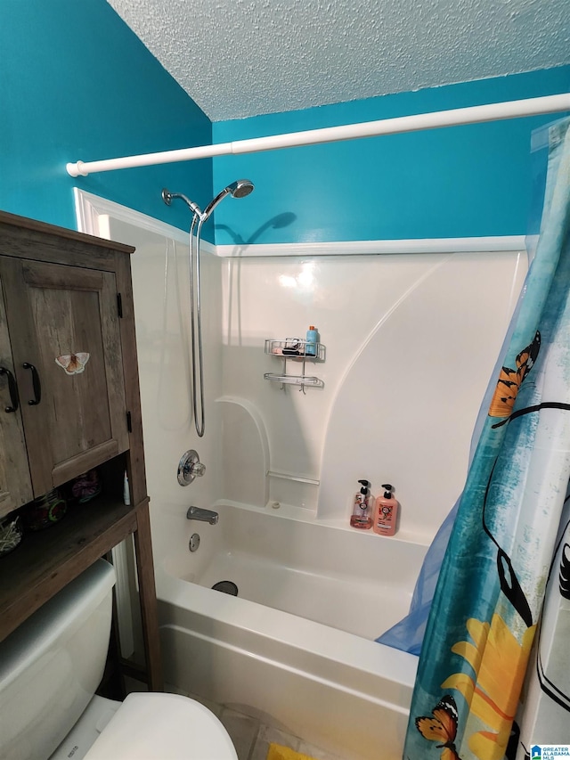 full bath with a textured ceiling, shower / tub combo, and toilet