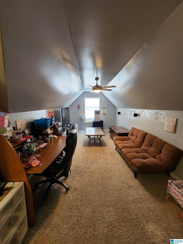 carpeted office featuring vaulted ceiling