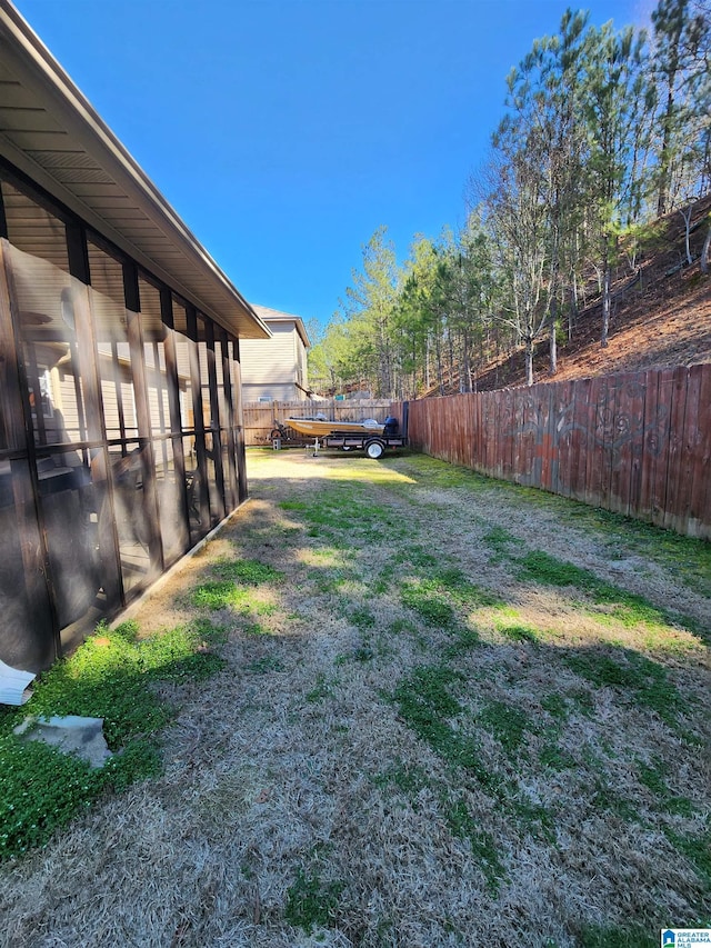 view of yard with a fenced backyard