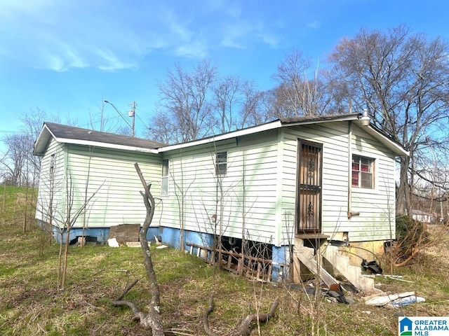 back of property with entry steps