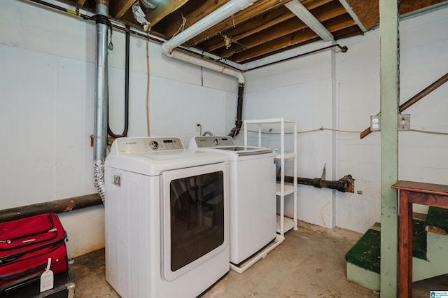 laundry room with washing machine and dryer and laundry area