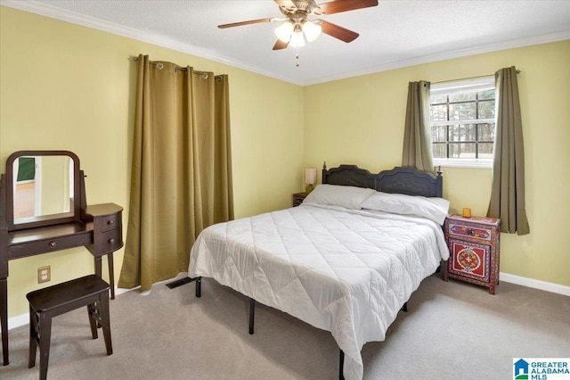 carpeted bedroom with ceiling fan, ornamental molding, a textured ceiling, and baseboards