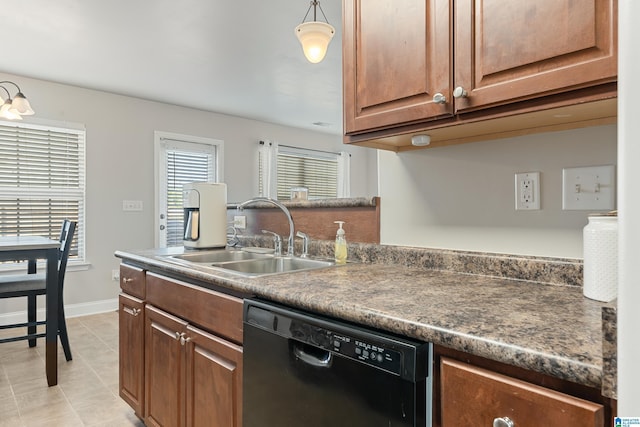 kitchen with a sink, dark countertops, a peninsula, light tile patterned floors, and dishwasher