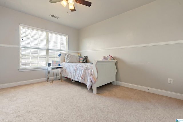 bedroom with visible vents, ceiling fan, baseboards, and carpet