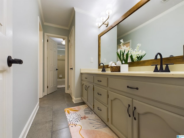 full bathroom with tile patterned flooring, baseboards, crown molding, and vanity