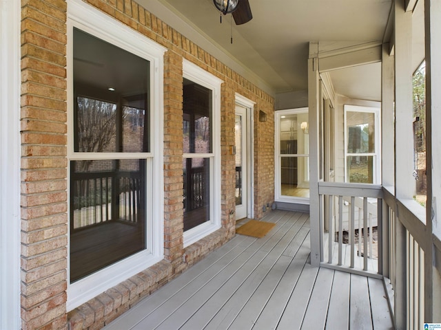 wooden deck with ceiling fan