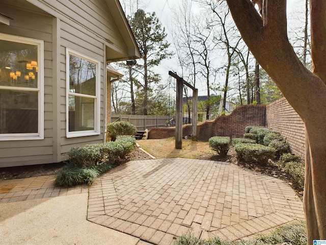 view of patio / terrace with fence