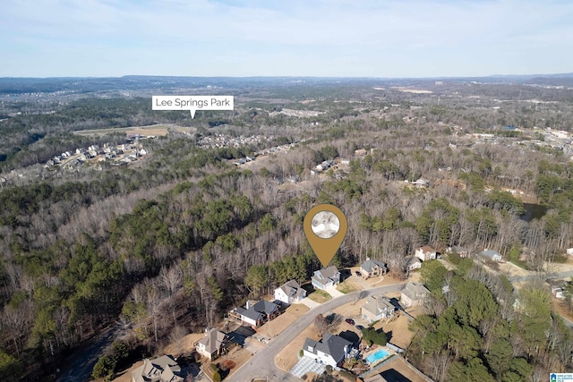 drone / aerial view with a view of trees